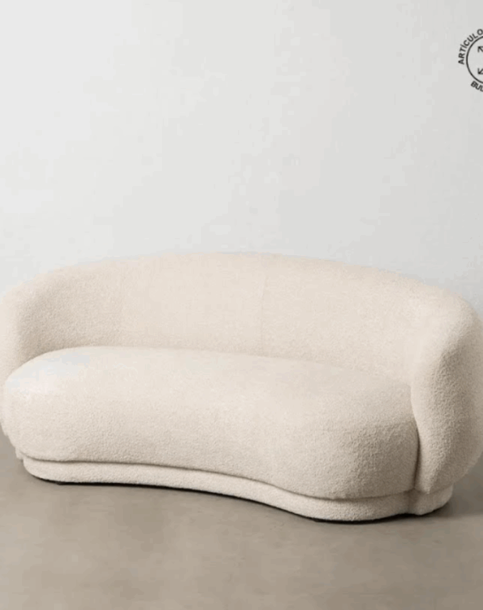 Canapé design beige en tissu bouclette