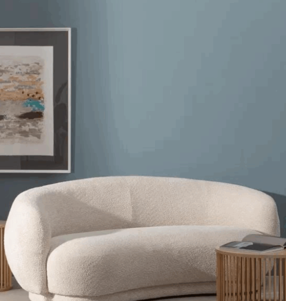 Canapé design beige en tissu bouclette
