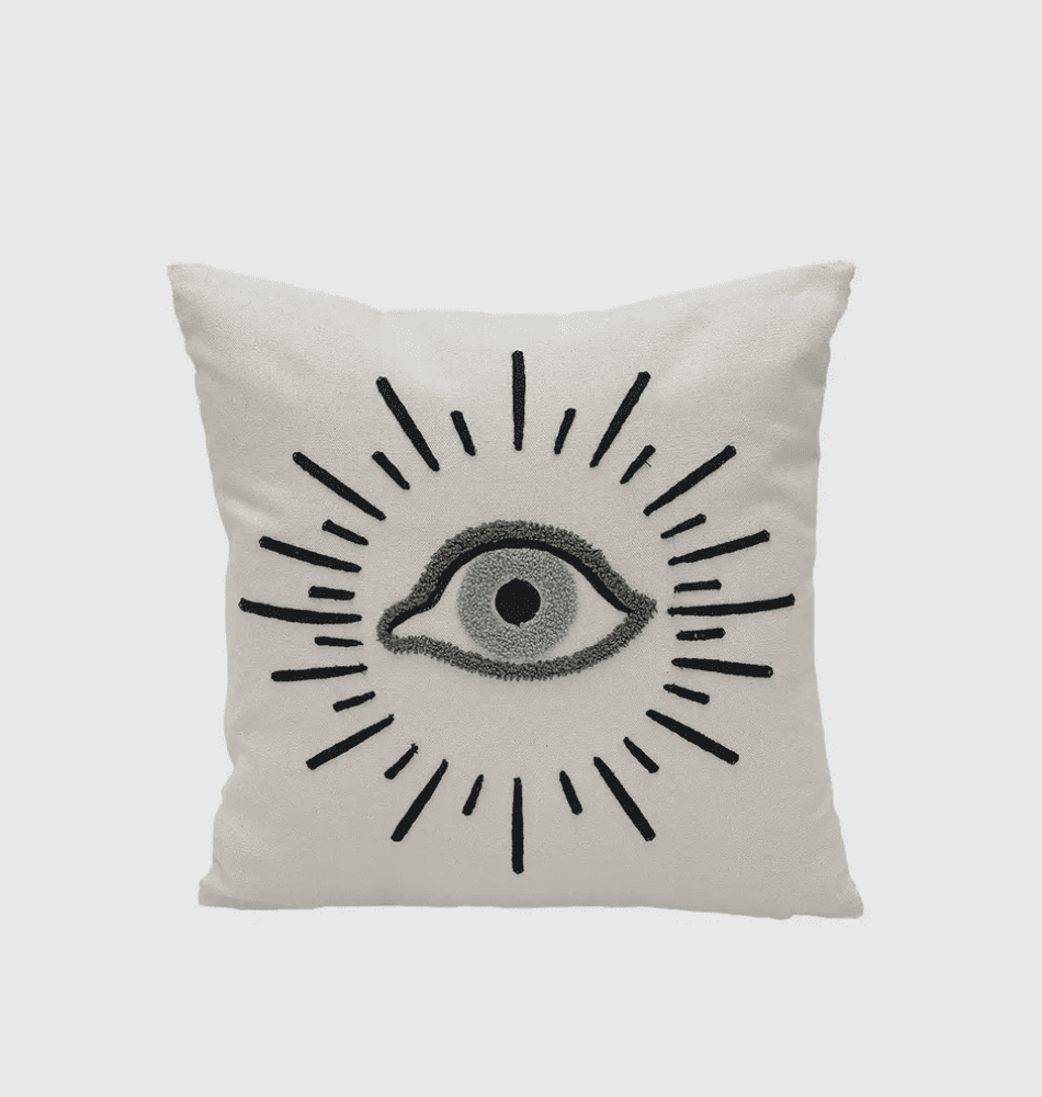 Coussin brodé œil bleu
